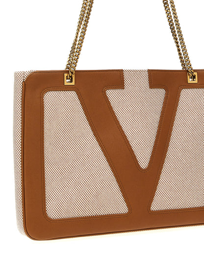 Medium Shopper Tote Bag by Valentino Garavani for women in stretch cotton modal canvas beige & signature features an jet-set Viva Superstar V Logo Stretch Cotton Modal Canvas Medium Shopper Tote Bag design with a secure zipper, ample , and versatile handle for an jet-set finish.
