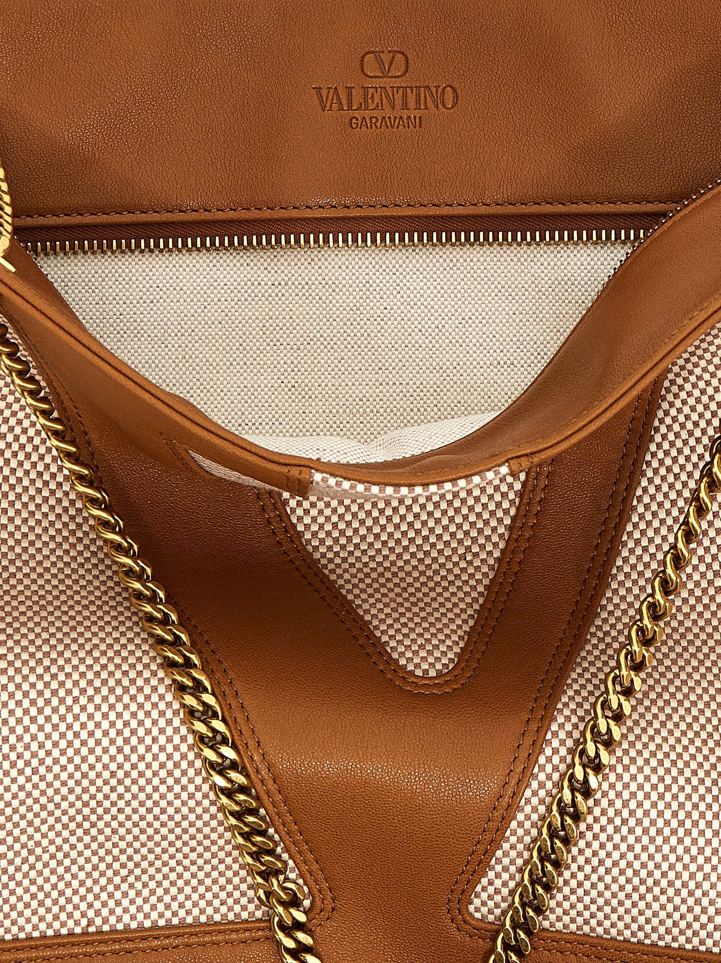Medium Shopper Tote Bag by Valentino Garavani for women in stretch cotton modal canvas beige & signature features an jet-setting Viva Superstar V Logo Stretch Cotton Modal Canvas Medium Shopper Tote Bag design with a secure zipper, jet-setting , and versatile handle for a jet-setting look.