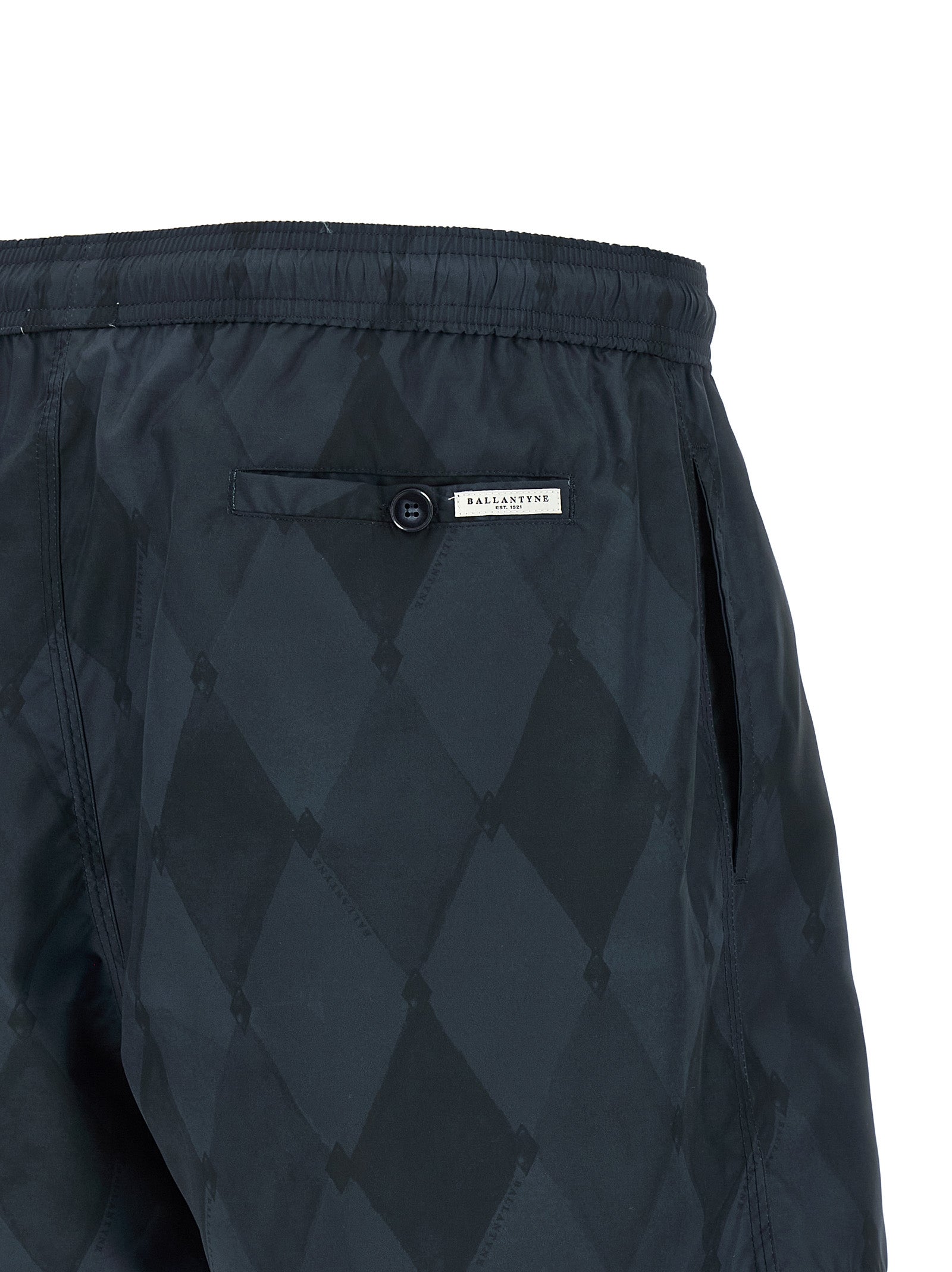 Swim Shorts by Ballantyne for men in polyester blue & patterned features a riviera-ready silhouette, showcasing the Men's Polyester Swim Shorts design for a premium look.