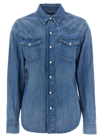 Blouse by Polo Ralph Lauren for women in denim cotton blue showcases a sharp silhouette, elegantly detailed with a sharp and sharp .