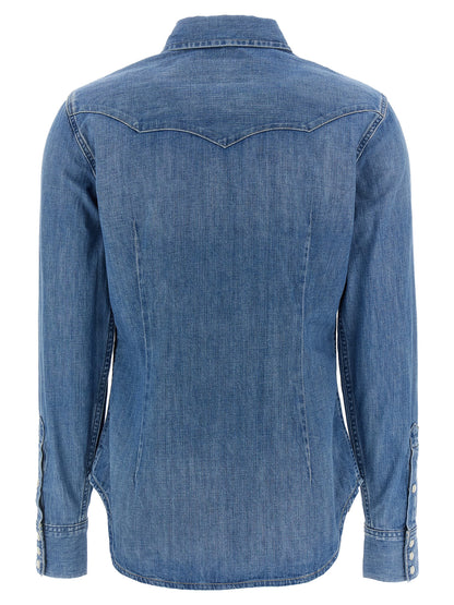 Blouse by Polo Ralph Lauren for women in denim cotton blue, featuring a nuanced and nuanced for a sophisticated finish.