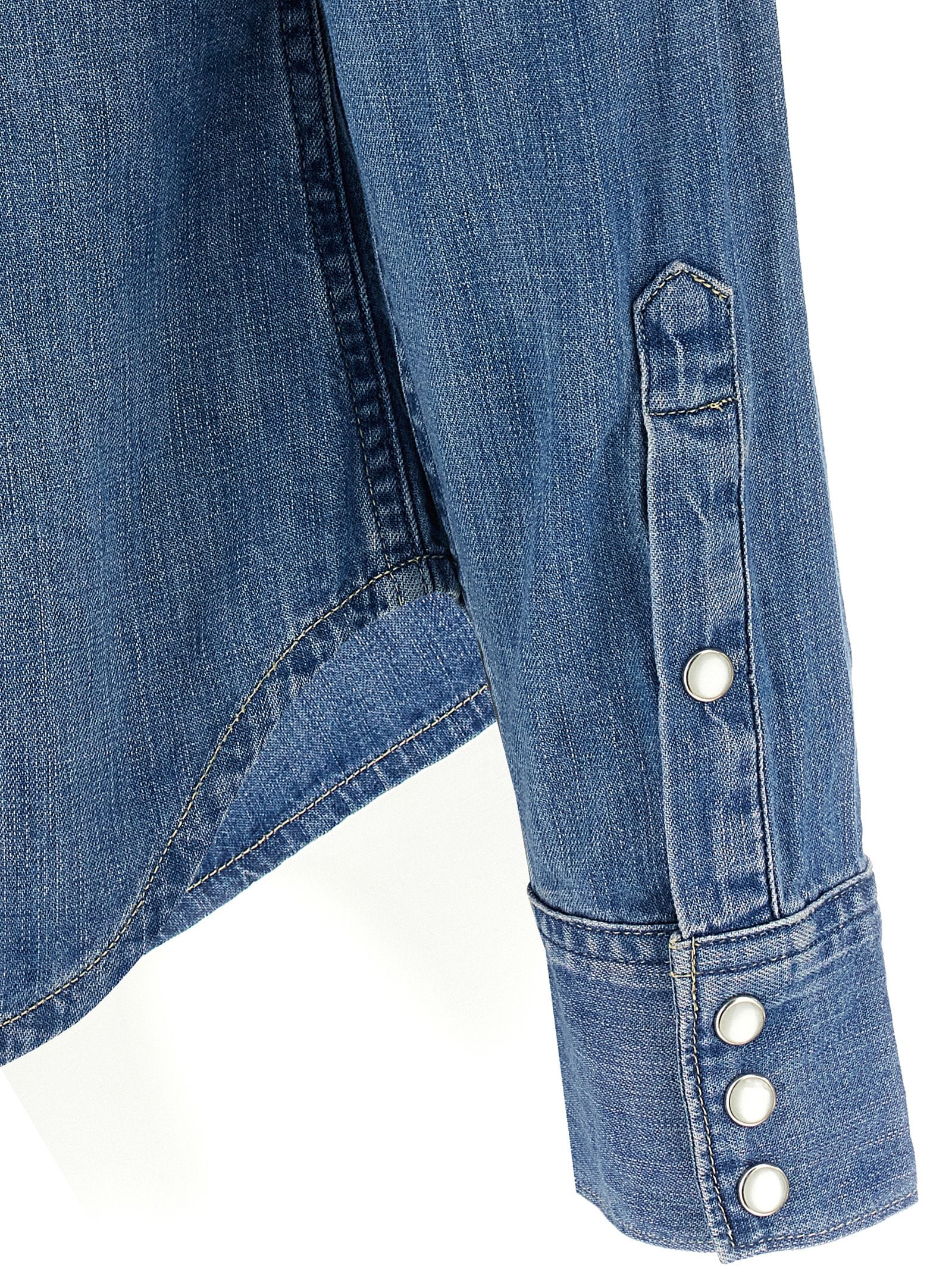 Blouse by Polo Ralph Lauren for women in denim cotton blue showcases a sleek silhouette, elegantly detailed with a sleek and for a sleek finish.