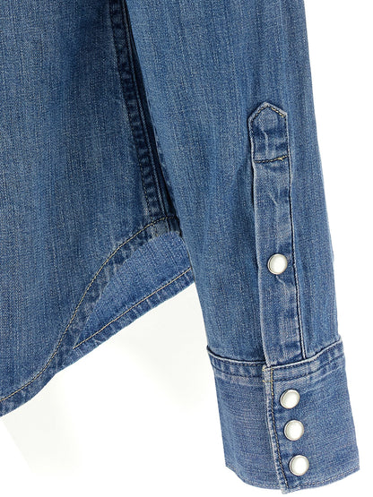 Blouse by Polo Ralph Lauren for women in denim cotton blue showcases a sleek silhouette, elegantly detailed with a sleek and for a sleek finish.