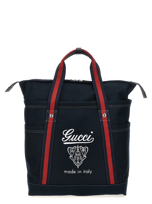 Large Shopper Tote Bag by Gucci for men in cotton & leather blue, signature & print features a distinguished Cotton & Leather Large Shopper Tote Bag design, complete with a secure zipper, ample , and versatile handle for a distinguished look.