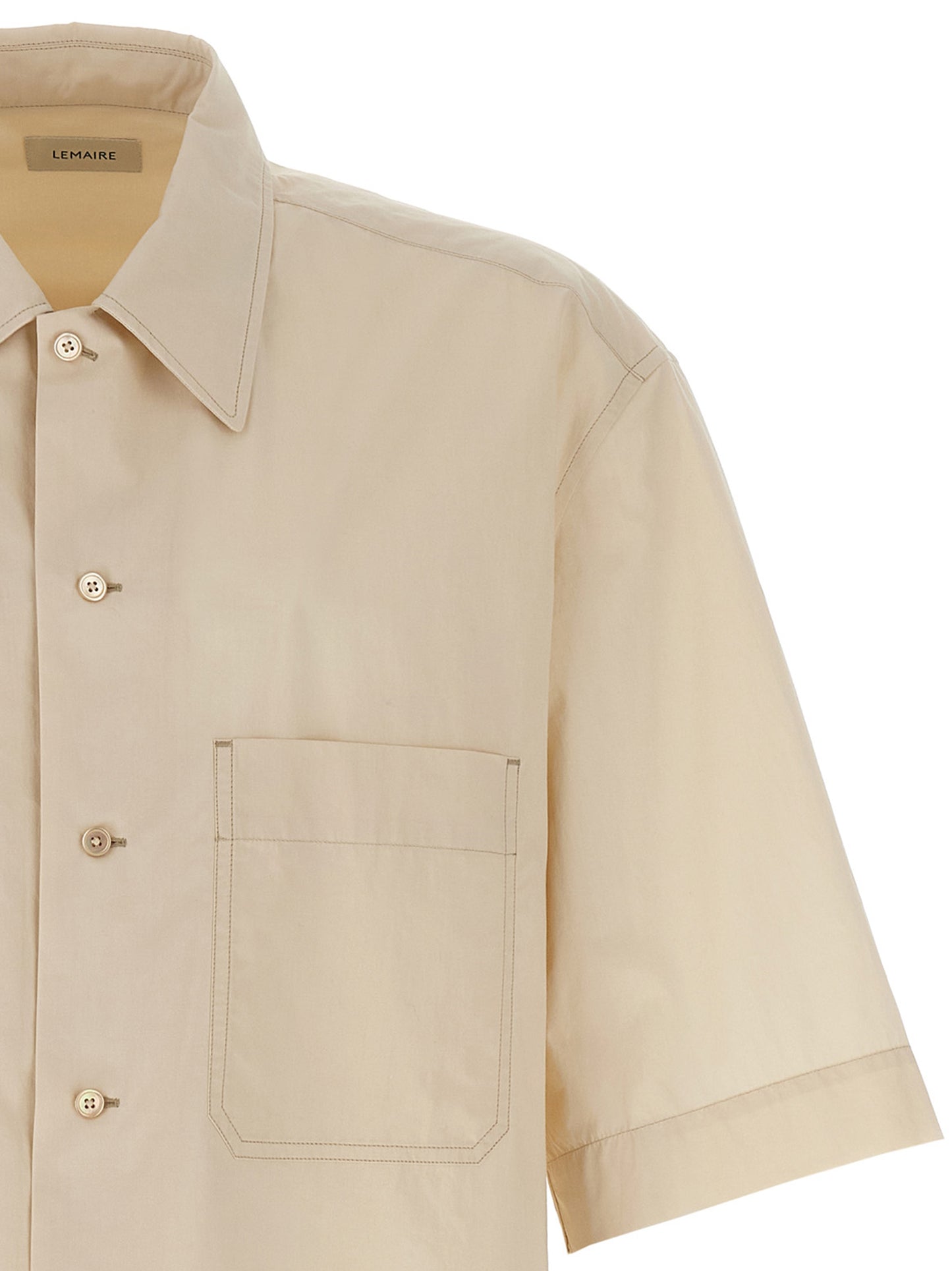 Shirt by Lemaire for men in cotton beige showcases a sharp silhouette, elegantly detailed with a sharp and sharp .