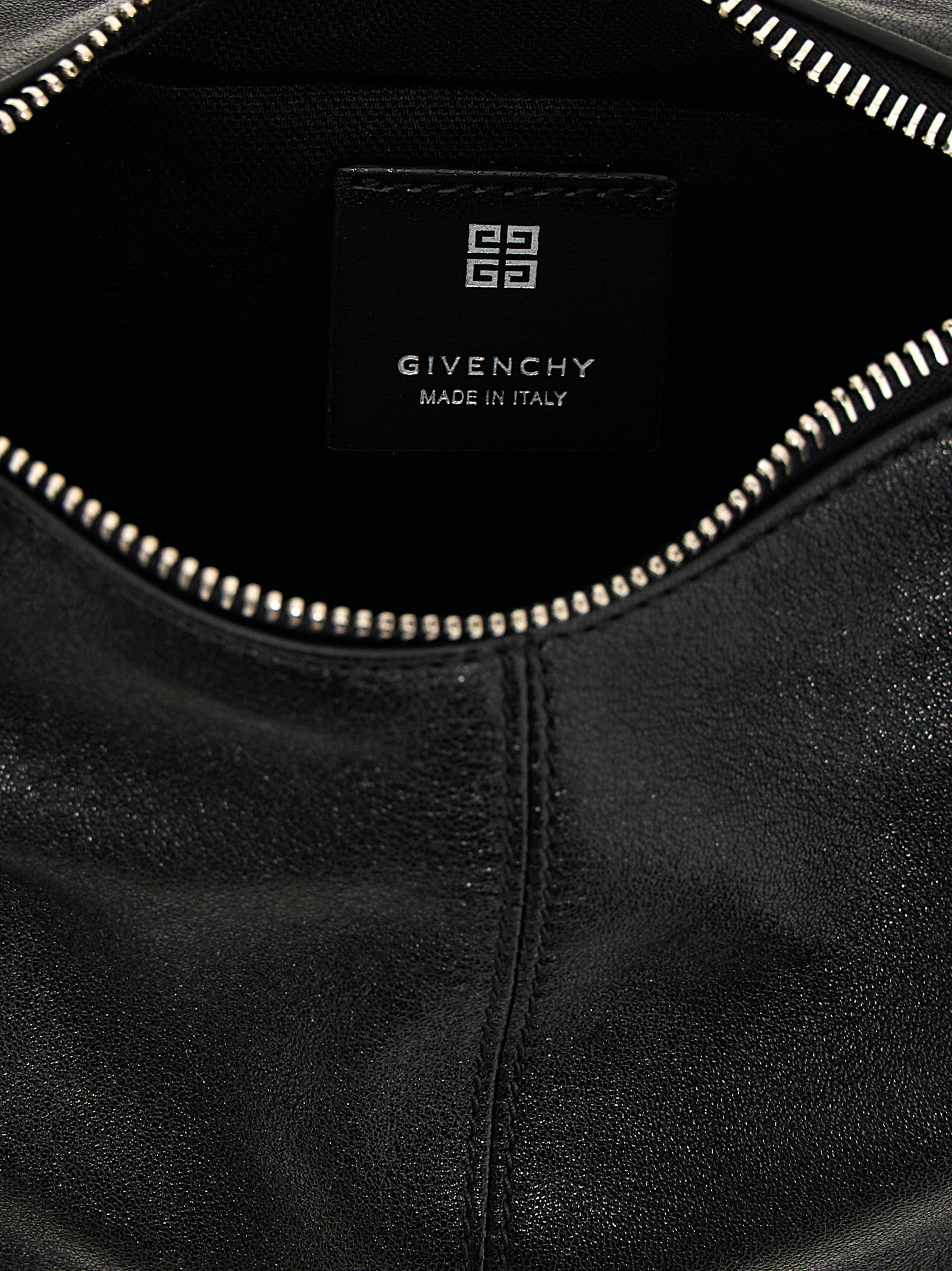 Shoulder Bag by Givenchy for women in polyester & lamb leather black features a distinguished silhouette, showcasing a secure zipper & buckle and distinguished with versatile shoulder-strap & handle for a distinguished finish.
