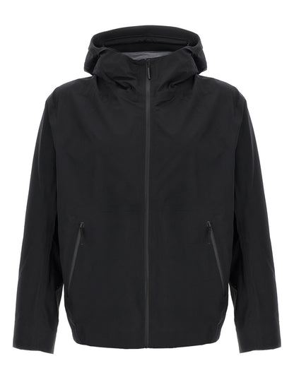 Hooded Windbreaker Jacket by Arc'teryx Veilance for men in nylon & silicone black showcases a urban chic silhouette, detailed with a urban chic hooded neckline and functional lightweight, pockets, hooded & windproof for a polished finish.