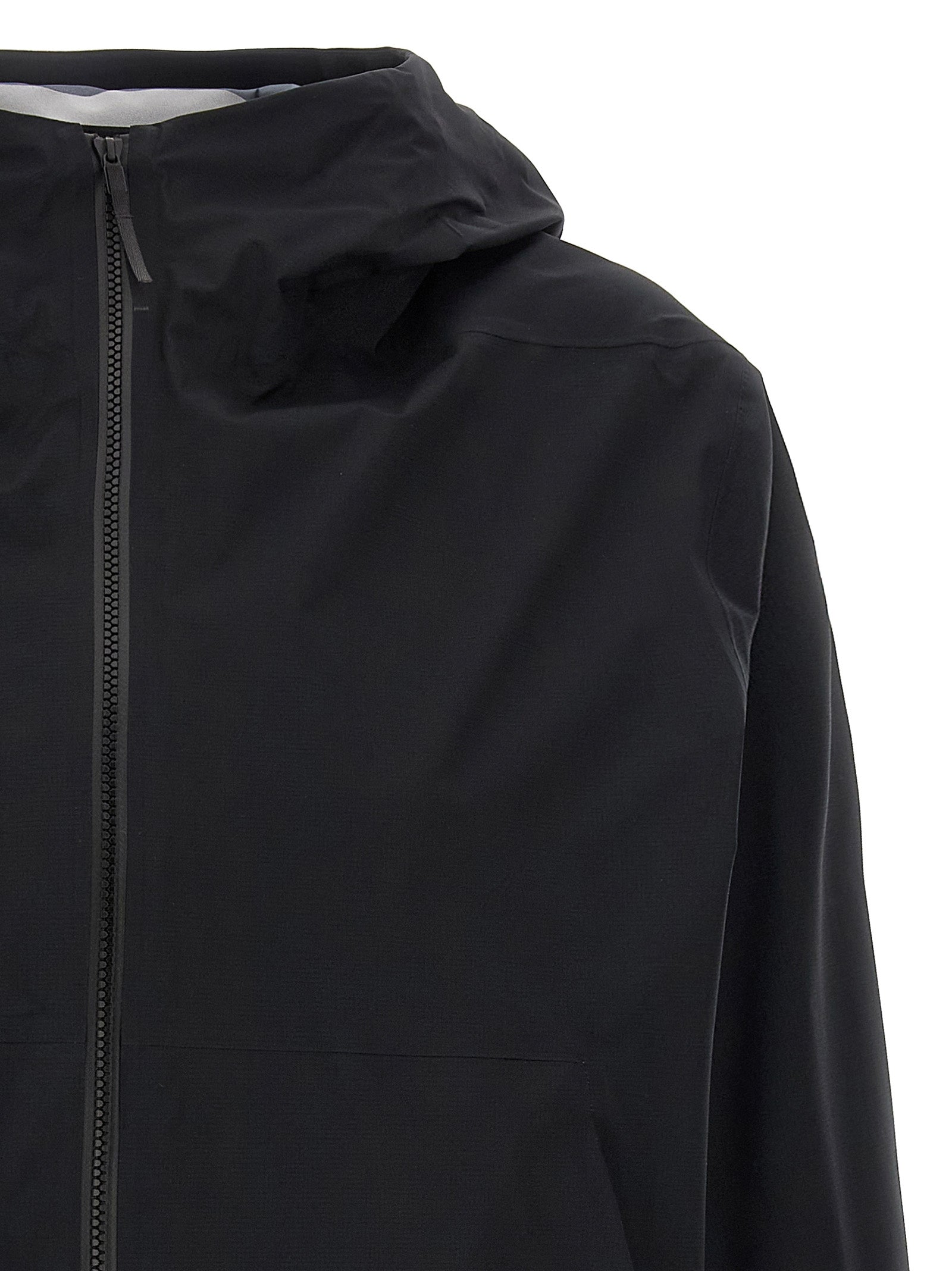 Hooded Windbreaker Jacket by Arc'teryx Veilance for women in nylon & silicone black features an magnificent silhouette, showcasing the sophisticated hooded neckline and functional water-resistant, windproof, lightweight, pockets & hooded for a premium, magnificent look.