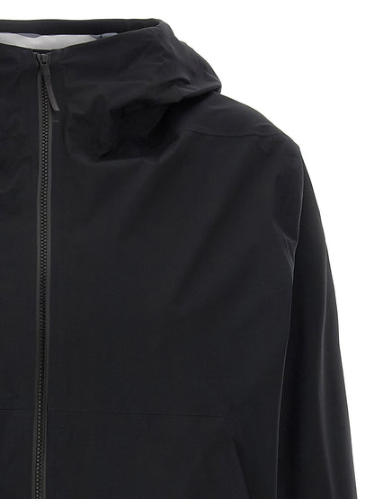 Hooded Windbreaker Jacket by Arc'teryx Veilance for women in nylon & silicone black features an magnificent silhouette, showcasing the sophisticated hooded neckline and functional water-resistant, windproof, lightweight, pockets & hooded for a premium, magnificent look.