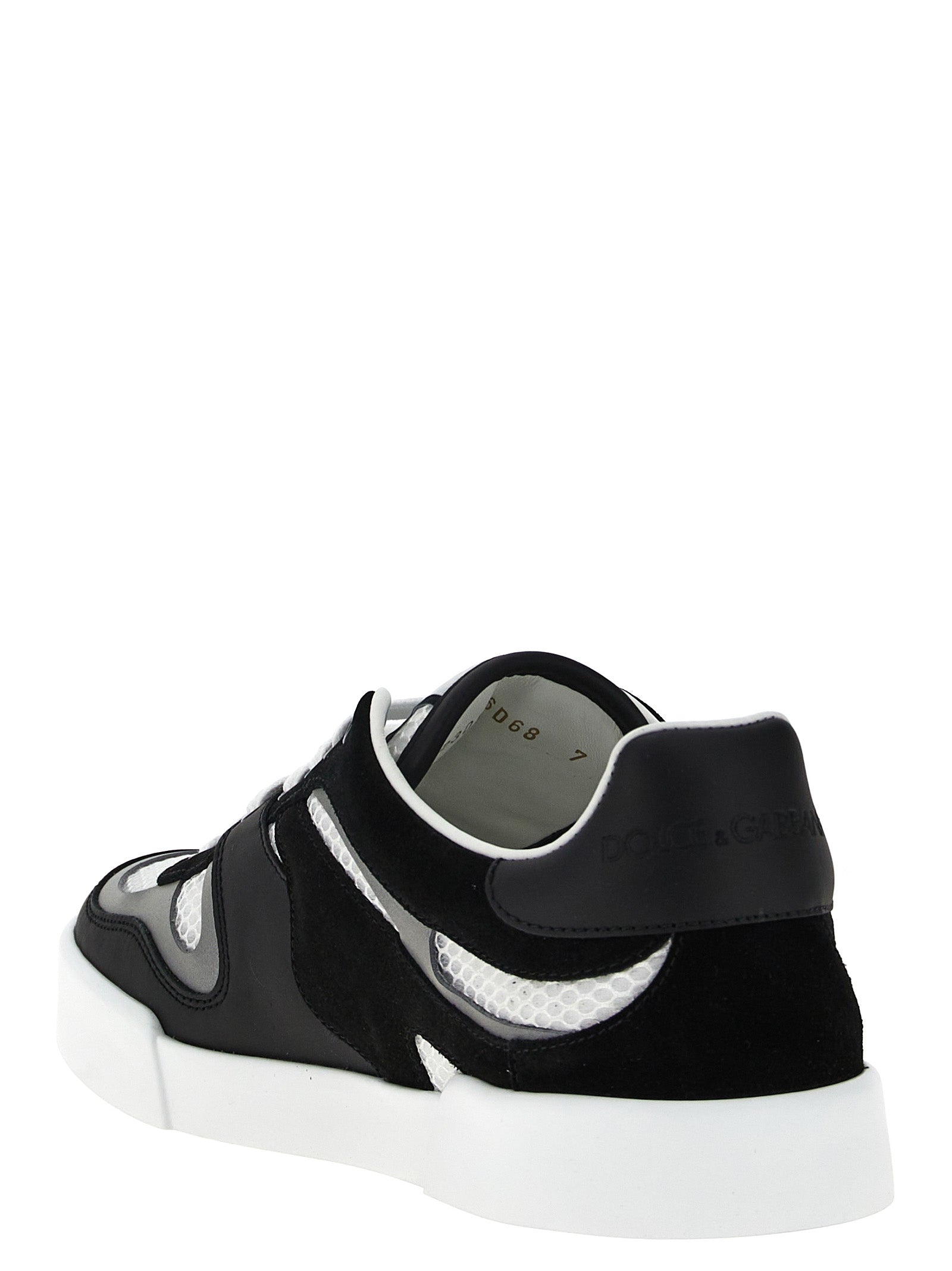Sneakers by Dolce & Gabbana for men in calfskin leather & polyester bicolour, black & white features an fashionable silhouette, showcasing the premium Men's Fashion Calfskin Leather & Polyester Sneakers in a fashionable fashion style that offers a fashionable finish for refined style.