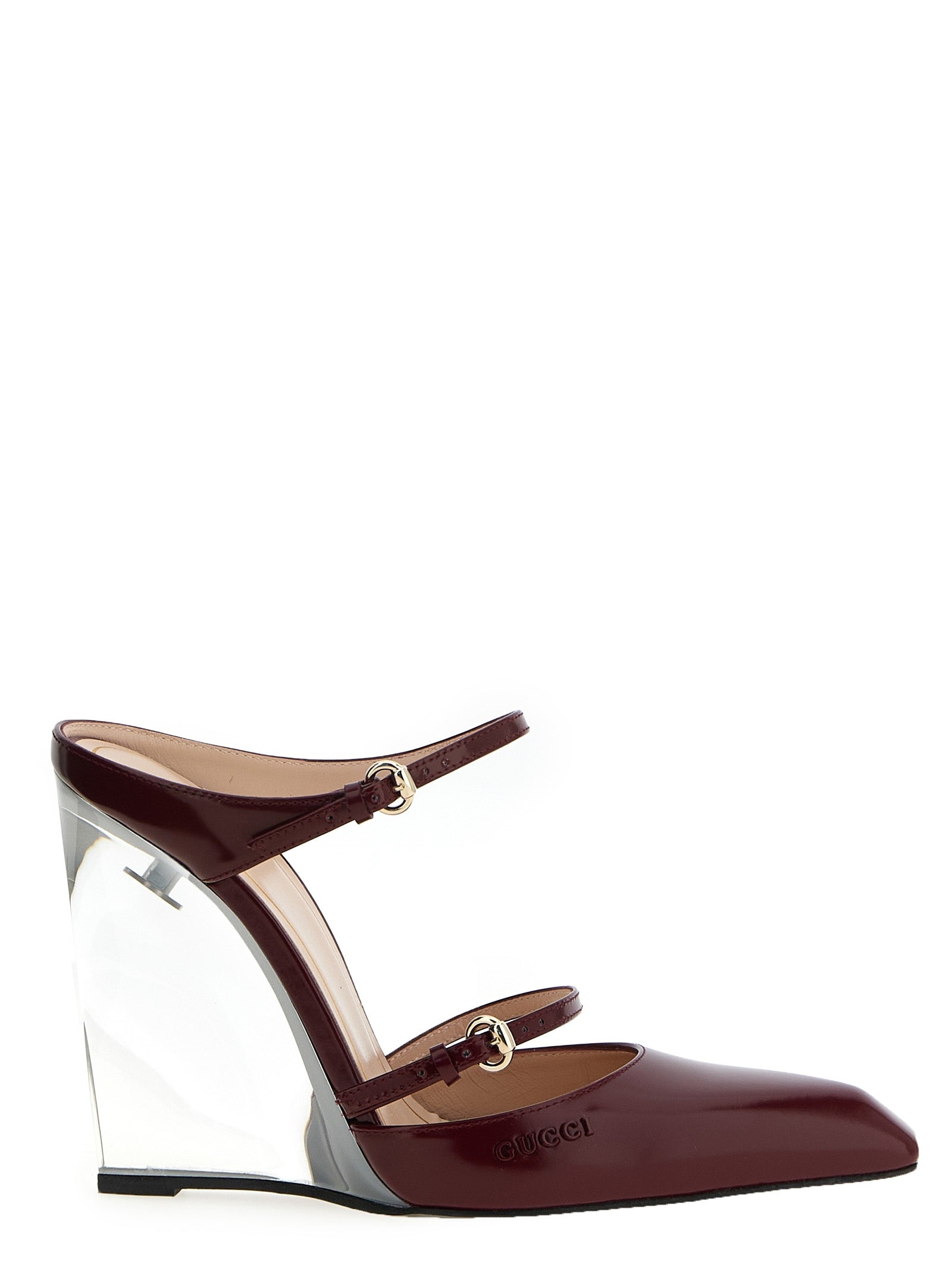 Wedge Sandals by Gucci for women in leather & metal multicolor, red & transparent presents a sculptural silhouette, showcasing the Women's Leather & Metal Wedge Sandals design with a sculptural wedge and for a premium look.