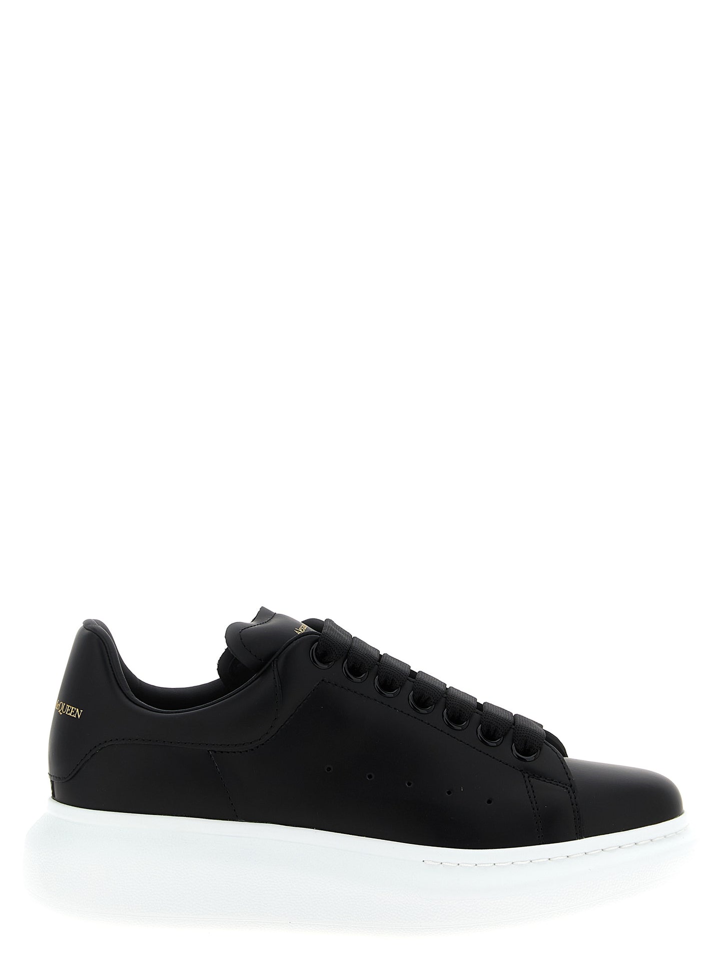 Sneakers by Alexander McQueen for women in bos taurus leather bicolour, black & white presents a on trend silhouette from the Women's Low Top Bos Taurus Leather Sneakers collection, showcasing a on trend low-top style for an elevated aesthetic.