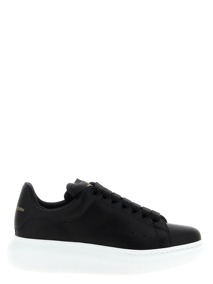 Sneakers by Alexander McQueen for women in bos taurus leather bicolour, black & white presents a on trend silhouette from the Women's Low Top Bos Taurus Leather Sneakers collection, showcasing a on trend low-top style for an elevated aesthetic.