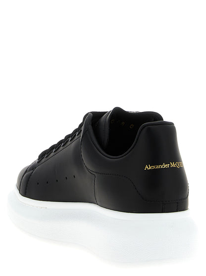 Sneakers by Alexander McQueen for women in bos taurus leather bicolour, black & white features an timeless silhouette from the Women's Low Top Bos Taurus Leather Sneakers collection, showcasing a signature low-top style with an timeless finish.