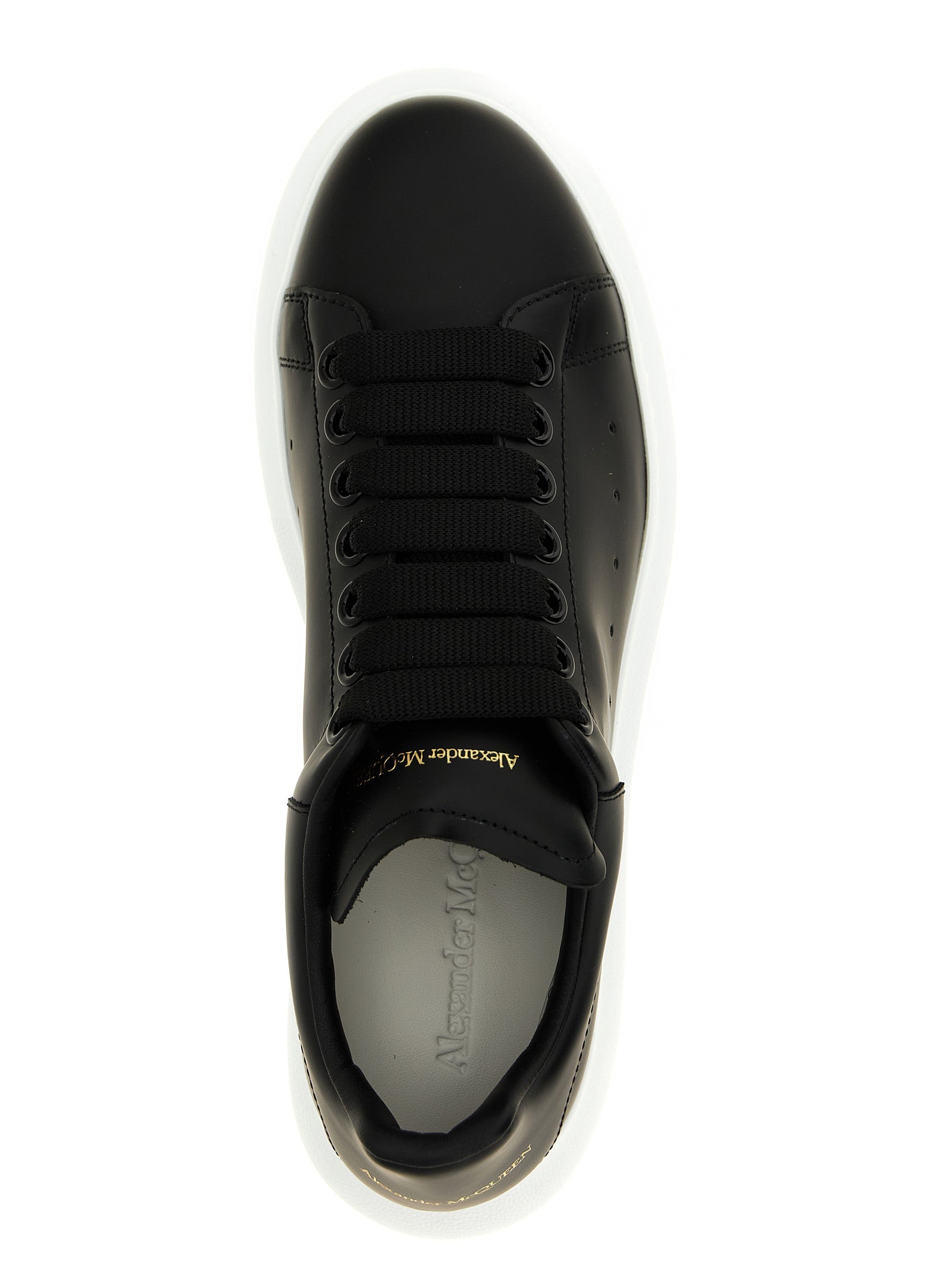 Sneakers by Alexander McQueen for women in bos taurus leather bicolour, black & white features an fashionable silhouette, showcasing the premium Women's Low Top Bos Taurus Leather Sneakers in a fashionable low-top style that offers a fashionable finish for refined style.