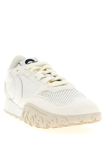 Athletic Sneakers by Marine Serre for women in suede calfskin leather white showcases an impeccable silhouette, defined by an impeccable athletic style design that perfectly captures the essence of the Women's Athletic Suede Calfskin Leather Sneakers.