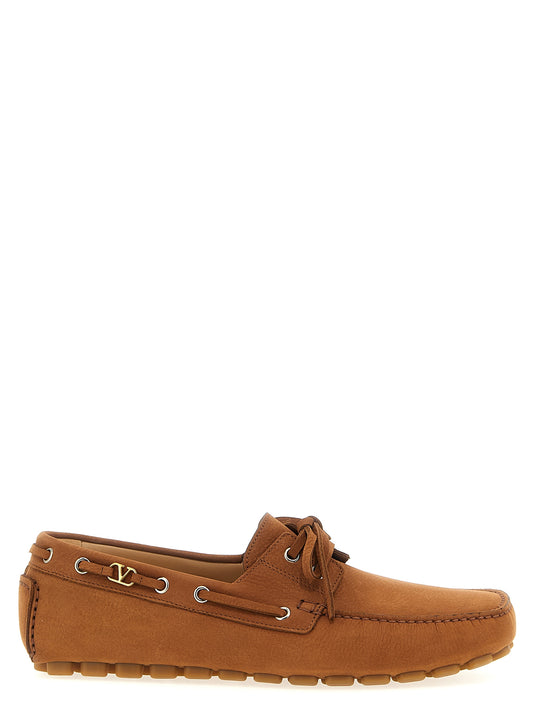 This Loafer Slip-On Lace-Up Shoes by Valentino Garavani for men in calfskin leather brown & signature features an exquisite silhouette from the V Logo Men's Calfskin Leather Loafer Slip-On Lace-Up Shoes collection, defined by a sophisticated and elegant .