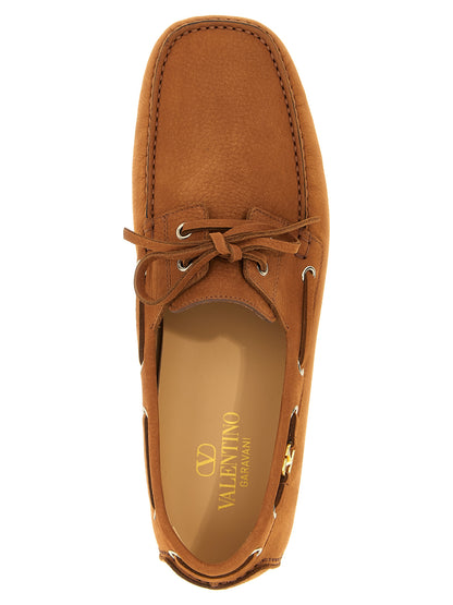 This Loafer Slip-On Lace-Up Shoes by Valentino Garavani for men in calfskin leather brown & signature features an exquisite silhouette from the V Logo Men's Calfskin Leather Loafer Slip-On Lace-Up Shoes collection, defined by a sophisticated and elegant .
