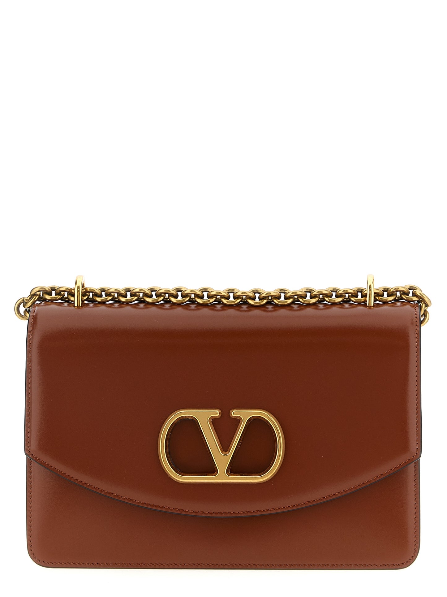 Shoulder Flap Bag by Valentino Garavani for women in nappa calfskin leather brown & signature features a effortless chic silhouette with a secure flap & magnetic, ample , and versatile shoulder-strap for a effortless chic finish.