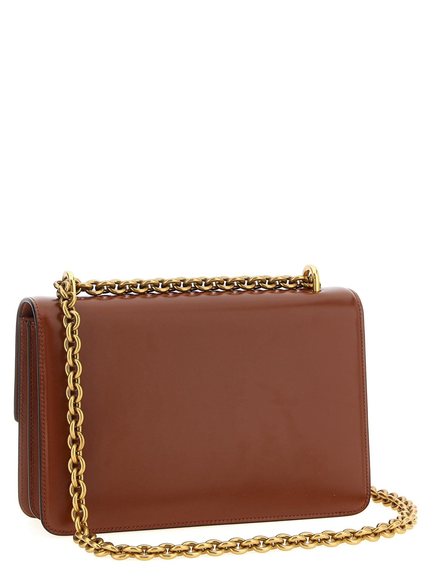 Shoulder Flap Bag by Valentino Garavani for women in nappa calfskin leather brown & signature features a distinguished silhouette, showcasing a secure flap & magnetic and distinguished with versatile shoulder-strap for a distinguished finish.