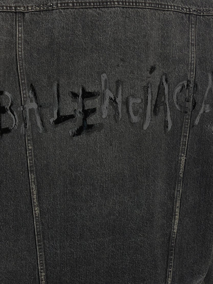 Trucker Jacket by Balenciaga for women in vinyl & denim cotton gray & print showcases a bohemian silhouette, artfully detailed with a bohemian and signature pockets for a truly bohemian finish.