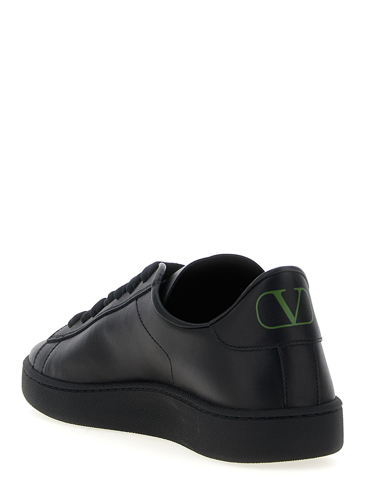 Sneakers by Valentino Garavani for men in calfskin leather black & signature presents a sumptuous silhouette, artfully capturing the essence of the V Logo Men's Low Top Calfskin Leather Sneakers with its sumptuous low-top style design.
