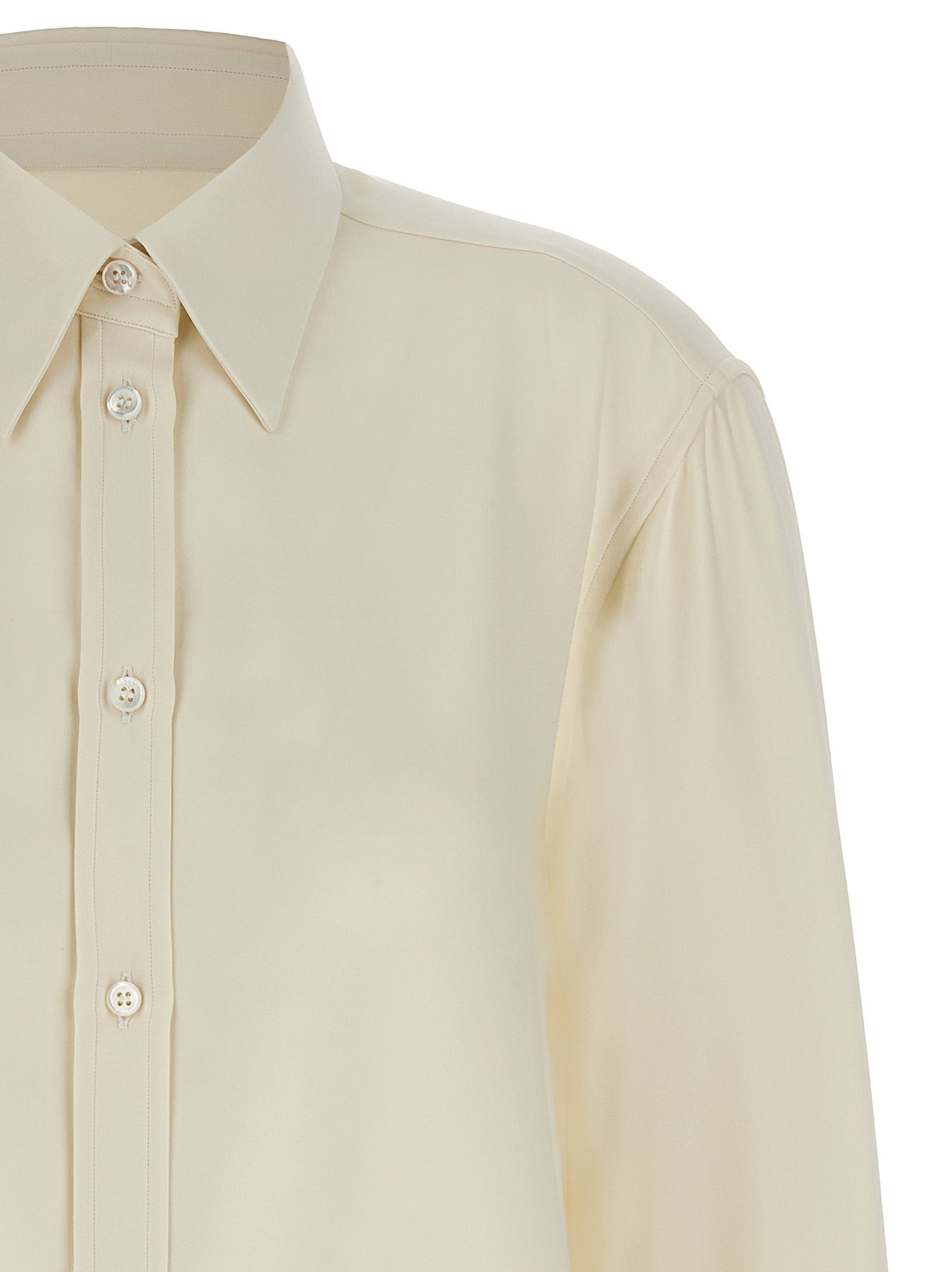 Blouse by Brioni for women in silk white presents a discerning silhouette, showcasing a sophisticated and for a truly discerning finish.
