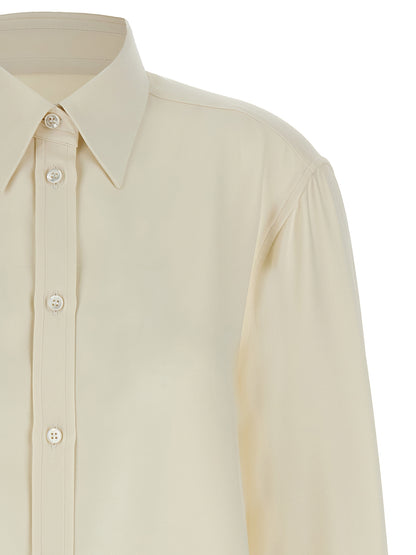Blouse by Brioni for women in silk white presents a discerning silhouette, showcasing a sophisticated and for a truly discerning finish.