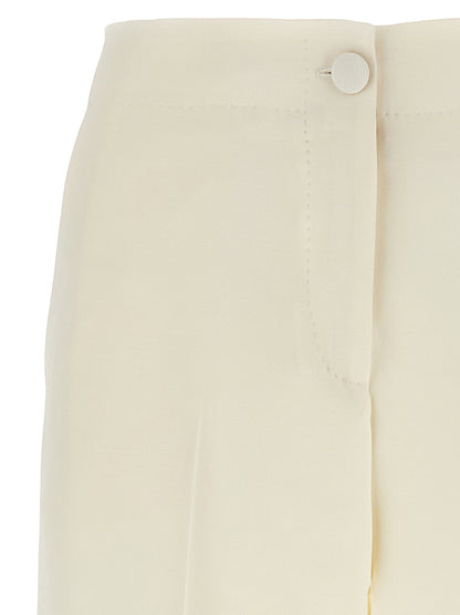 Trousers by Brioni for women in wool & silk white presents a smart silhouette, meticulously detailed with a smart straight-leg & wide, a smart long, and a smart .