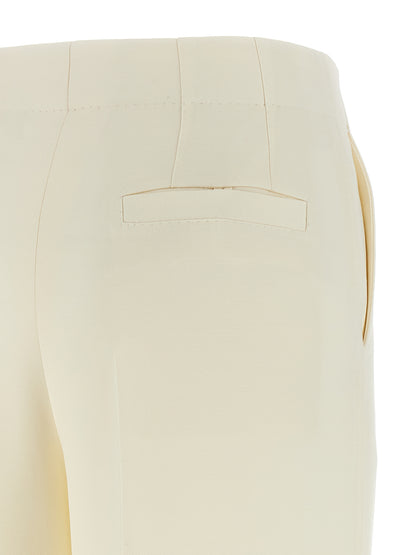 Trousers by Brioni for women in wool & silk white features a artisanal silhouette, showcasing a sophisticated straight-leg & wide with a long and for a artisanal finish.