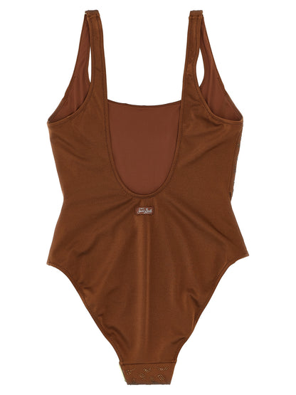 One-Piece Swimsuit by MC2 Saint Barth for women in polyester & rhinestones animal, brown & print showcases a couture inspired silhouette from the Women's Polyester & Rhinestones One-Piece Swimsuit collection, featuring a couture inspired cut designed for a couture inspired and couture inspired poolside look.