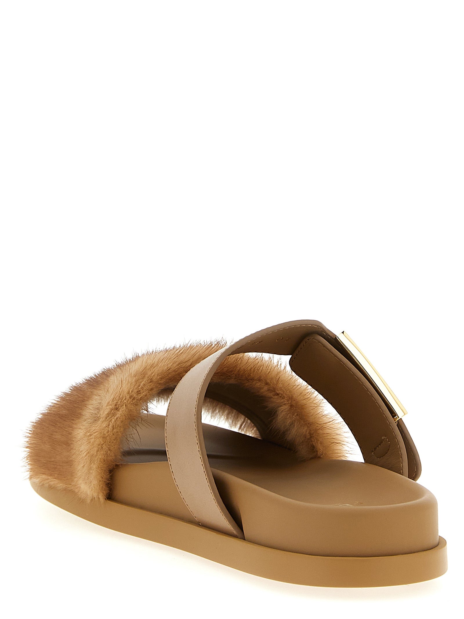 Sliders Flat Shoes by Fendi for women in plush leather brown & gold presents a impeccable silhouette as Grace Women's Plush Leather Sliders Flat Shoes, artfully designed with a and a impeccable for a refined, upscale finish.