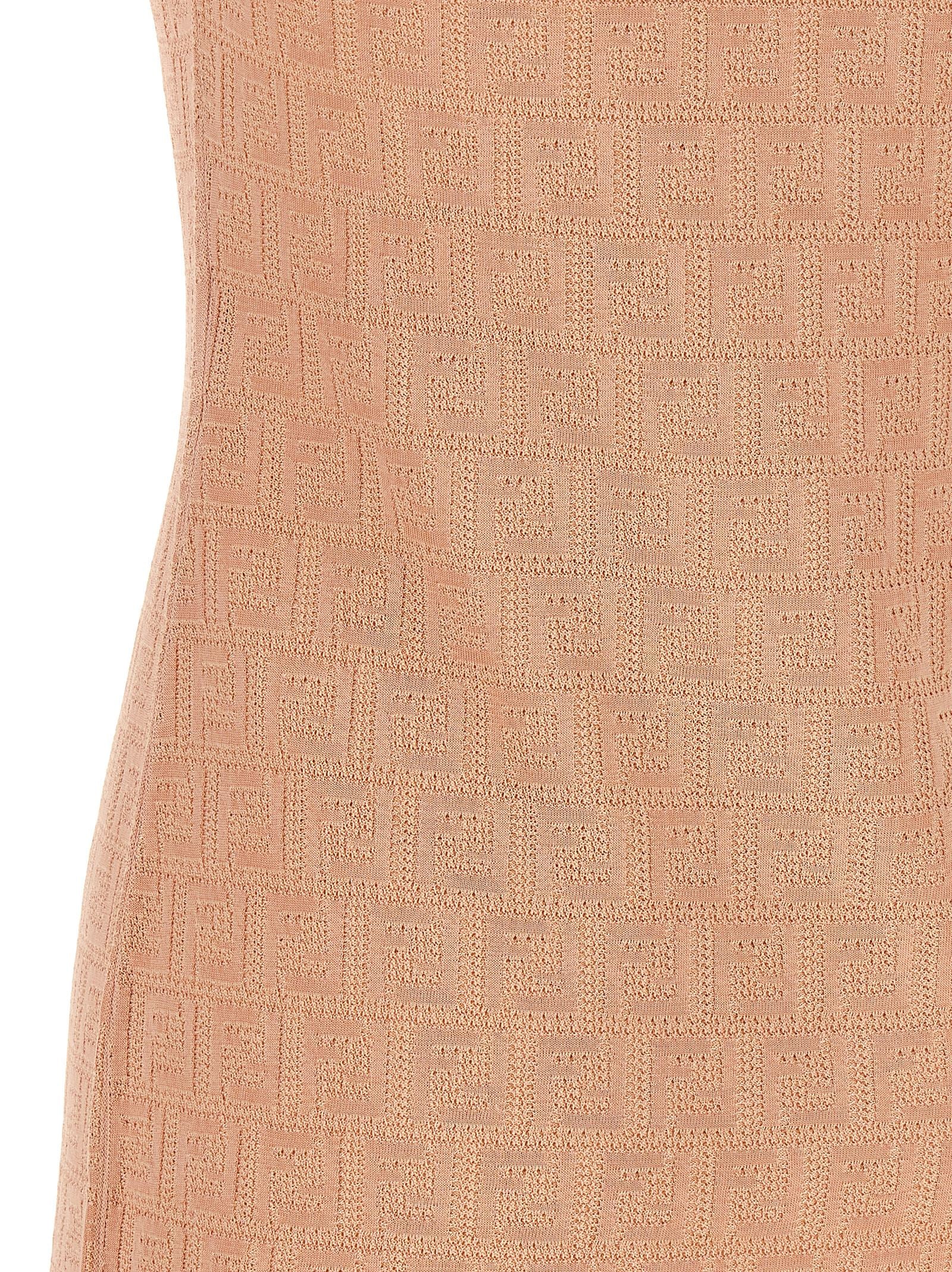 Dress by Fendi for women in cotton multicolor, pink & patterned features an sultry silhouette defined by a and , falling to an sultry short mini for a sultry look.