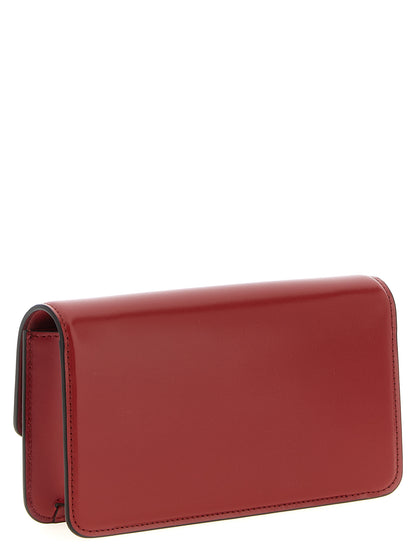 Evening Flap Clutch Handbag by Valentino Garavani for women in calfskin leather multicolor, red & signature showcases a sculptural silhouette, featuring a secure flap & magnetic, ample , and versatile shoulder-strap, adjustable-strap & detachable-strap for a sculptural finish.