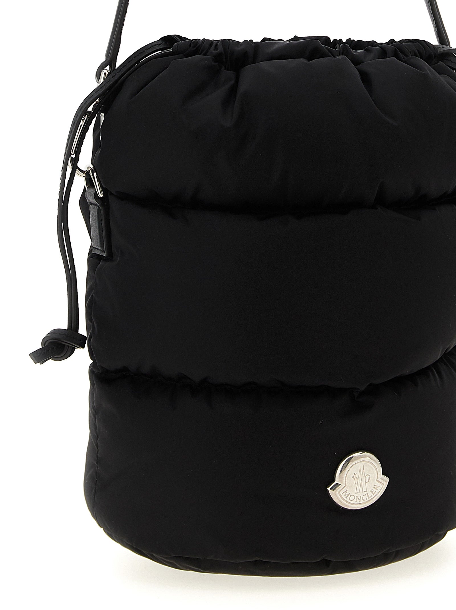 Mini Crossbody Bucket Handbag by Moncler for women in nylon polyamide leather black & silver features an refined silhouette, showcasing a secure drawstring, ample , and versatile crossbody-strap, shoulder-strap, adjustable-strap, detachable-strap & handle for a sophisticated refined aesthetic.