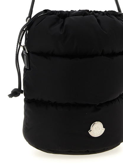 Mini Crossbody Bucket Handbag by Moncler for women in nylon polyamide leather black & silver features an refined silhouette, showcasing a secure drawstring, ample , and versatile crossbody-strap, shoulder-strap, adjustable-strap, detachable-strap & handle for a sophisticated refined aesthetic.