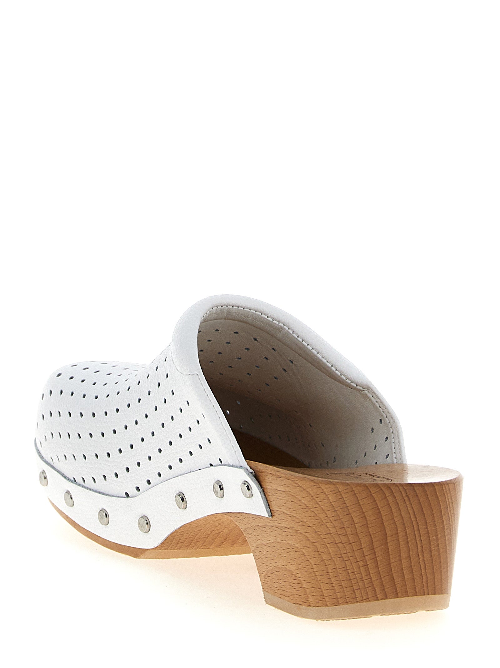 Clogs Flat Shoes by Balenciaga for women in calfskin leather white presents a impeccable silhouette as Women's Calfskin Leather Clogs Flat Shoes, artfully designed with a and a impeccable square toe style for a refined, upscale finish.