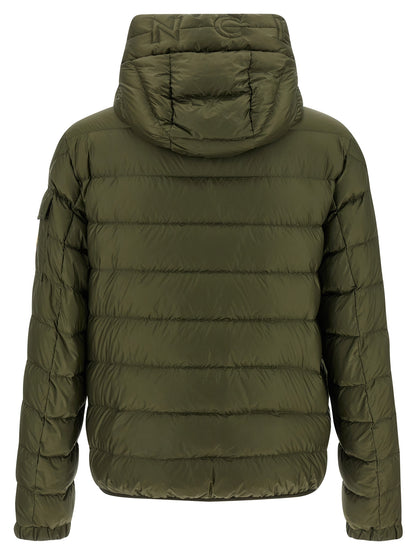 Hooded Puffer Jacket by Moncler for men in polyamide felt & goose-down bicolour & green presents a effortlessly chic silhouette, showcasing a sophisticated hooded neckline and premium pockets, hooded & insulated for a truly effortlessly chic finish.