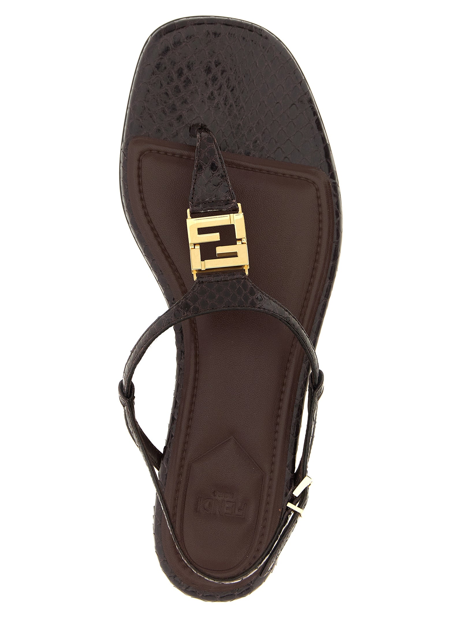 Flat Thong Sandals by Fendi for women in ayers calf leather purple showcases a sculptural silhouette as Women's Ayers Calf Leather Flat Thong Sandals, defined by a sculptural flat and sculptural square toe style for a sculptural look.