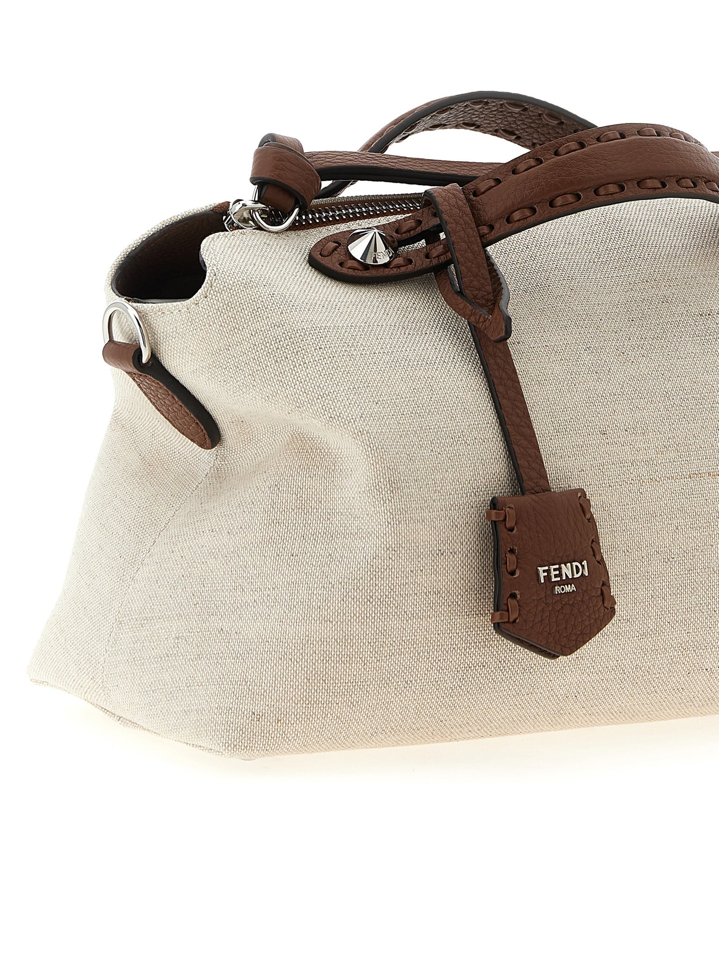 Medium Shoulder Handbag by Fendi for women in poly cotton canvas & leather beige features an refined silhouette, showcasing a secure zipper, ample , and versatile shoulder-strap, adjustable-strap & handle for a sophisticated refined aesthetic.