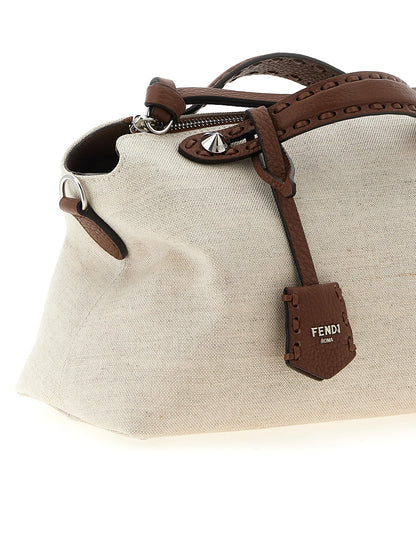 Medium Shoulder Handbag by Fendi for women in poly cotton canvas & leather beige features an refined silhouette, showcasing a secure zipper, ample , and versatile shoulder-strap, adjustable-strap & handle for a sophisticated refined aesthetic.