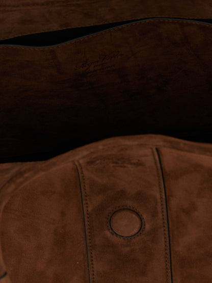 This Shopper Tote Bag by Roger Vivier for women in viscose & synthetic fur brown & signature features an jet-set Viv Viscose & Synthetic Fur Shopper Tote Bag design with a secure flap, magnetic & buckle, ample , and jet-set adjustable-strap & handle.