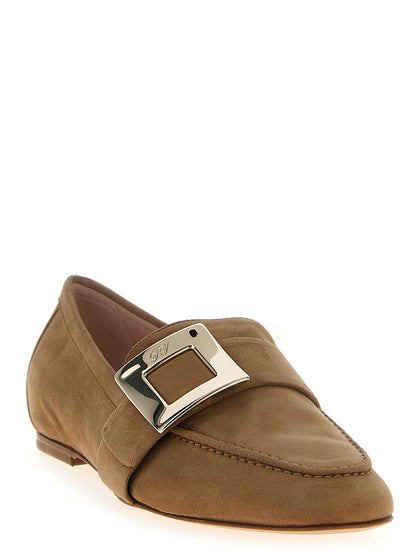 Flat Loafer Slip-On Shoes by Roger Vivier for women in suede goatskin leather beige & signature showcases a resplendent Women's Suede Goatskin Leather Flat Loafer Slip-On Shoes aesthetic, defined by its resplendent and elegant flat.