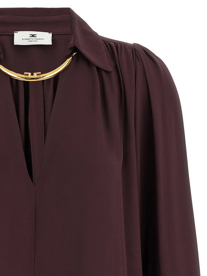 Blouse by Elisabetta Franchi for women in viscose purple features an architectural silhouette with a refined and elegant v-neck neckline for a architectural look.