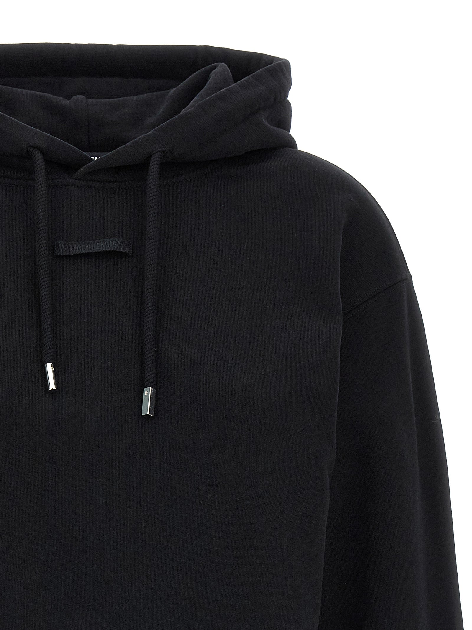 Sweatshirt Hoodie by Jacquemus for women in cotton black features an luminous silhouette, showcasing a sophisticated hooded neckline and for a truly luminous look.