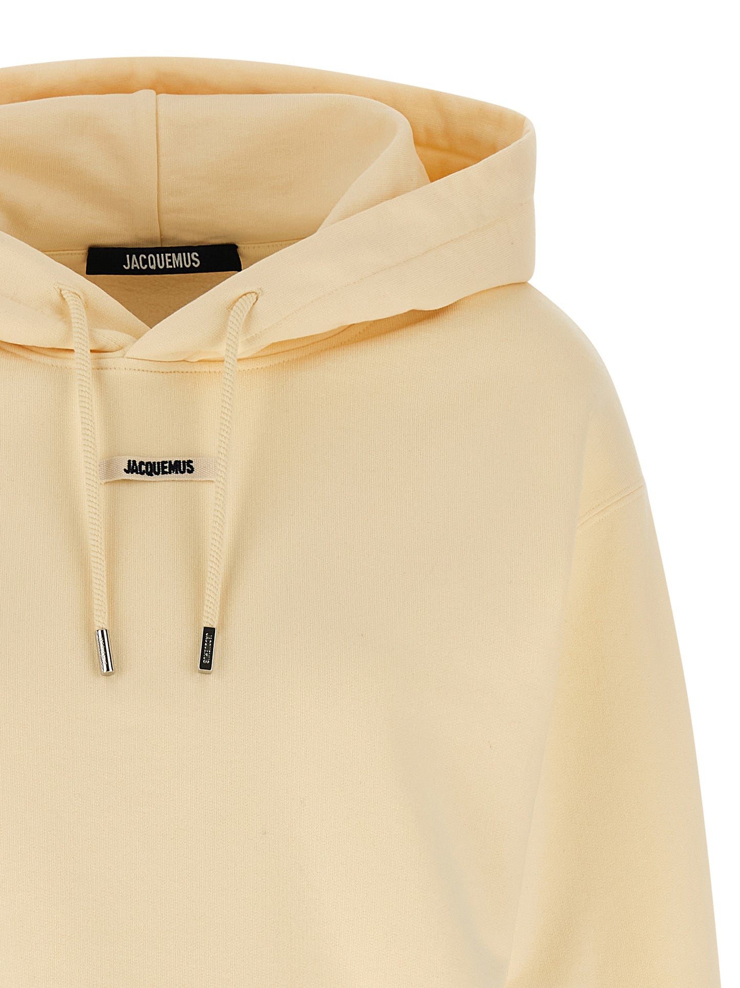 Sweatshirt Hoodie by Jacquemus for women in cotton beige features an luminous silhouette, showcasing a sophisticated hooded neckline and for a truly luminous look.