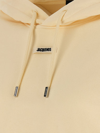 Sweatshirt Hoodie by Jacquemus for women in cotton beige showcases a city-ready silhouette, artfully detailed with a signature and for a city-ready finish.