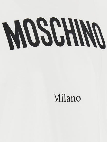 T-Shirt by Moschino for men in cotton bicolour, black, white & print showcases a fashionable silhouette, elegantly detailed with a fashionable and for a sophisticated, high-fashion look.