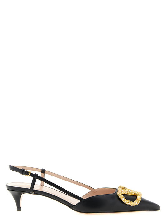 Mid-Heel Slingback Pumps Heels by Valentino Garavani for women in calfskin leather black & signature features an effortlessly chic silhouette from the V Logo Women's Calfskin Leather Mid-Heel Slingback Pumps Heels collection, showcasing a mid-heel and effortlessly chic pointed toe style for a effortlessly chic look.