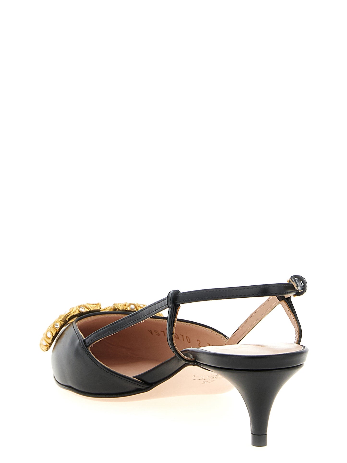 This Mid-Heel Slingback Pumps Heels by Valentino Garavani for women in calfskin leather black & signature presents a effortlessly chic silhouette from the V Logo Women's Calfskin Leather Mid-Heel Slingback Pumps Heels collection, featuring a effortlessly chic mid-heel and effortlessly chic pointed toe style.